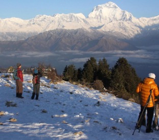 tourist take pictures at poonhill 2 1 1